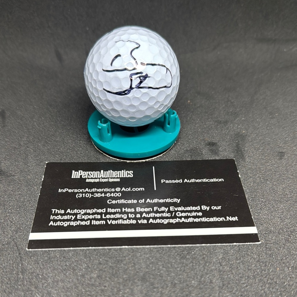 Autographed White Golf Ball with Teal Stand